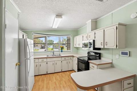 335 San Mateo Boulevard, Titusville FL - photo 11 of 30