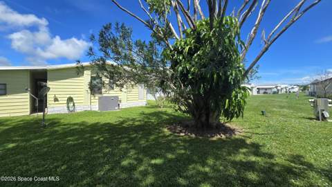 1471 Barefoot Circle, Barefoot Bay FL - photo 8 of 20