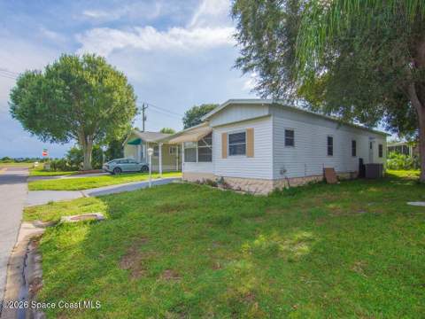 703 Lark Drive, Barefoot Bay FL - photo 6 of 85