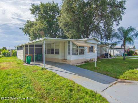 703 Lark Drive, Barefoot Bay FL - photo 9 of 85
