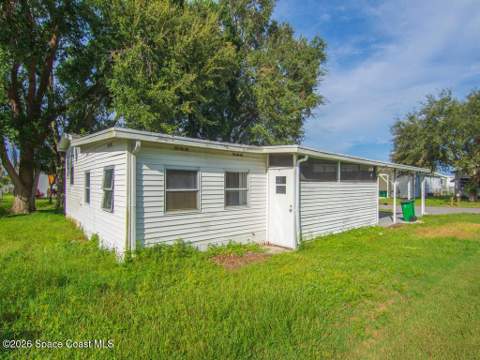 703 Lark Drive, Barefoot Bay FL - photo 10 of 85