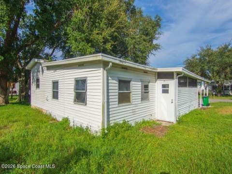 703 Lark Drive, Barefoot Bay FL - photo 11 of 85