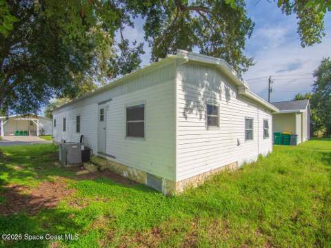 703 Lark Drive, Barefoot Bay FL - photo 12 of 85