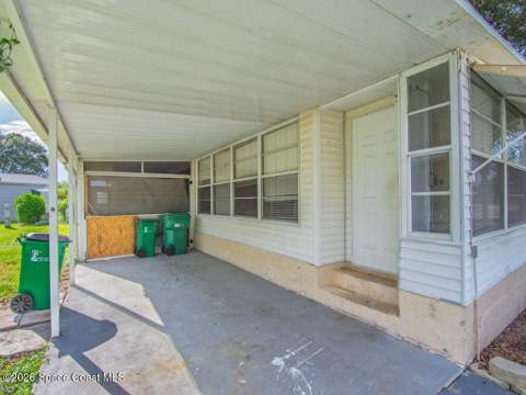 703 Lark Drive, Barefoot Bay FL - photo 14 of 85