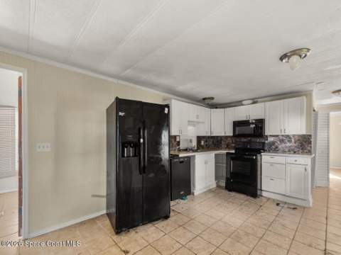 703 Lark Drive, Barefoot Bay FL - photo 21 of 85
