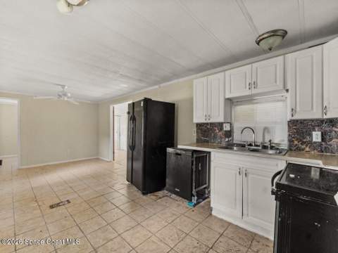 703 Lark Drive, Barefoot Bay FL - photo 22 of 85