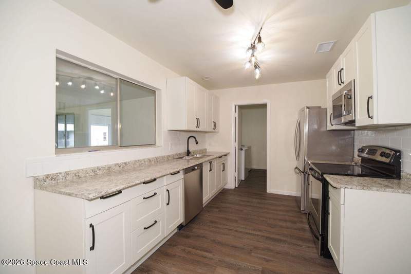 4 bedroom Single Family Residence at 653 Atlas Avenue, Port Malabar Unit 5, Palm Bay — photo 3