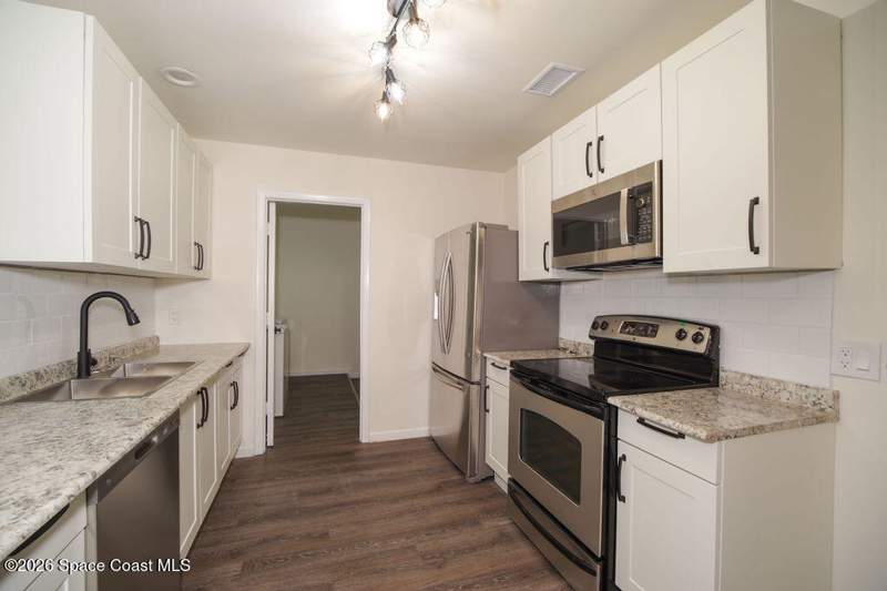 4 bedroom Single Family Residence at 653 Atlas Avenue, Port Malabar Unit 5, Palm Bay — photo 4