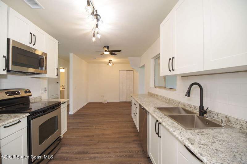 4 bedroom Single Family Residence at 653 Atlas Avenue, Port Malabar Unit 5, Palm Bay — photo 5