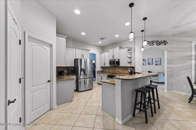 4 bedroom Single Family Residence at 1848 Windbrook Drive, Summerfield at Bayside Lakes Phase 2, Palm Bay — photo 4