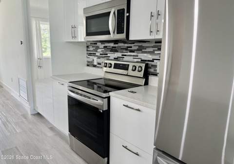 1370 Cogan Drive, Palm Bay FL - photo 8 of 34