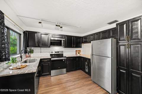 907 Osprey Drive, Melbourne FL - photo 7 of 36