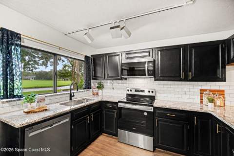 907 Osprey Drive, Melbourne FL - photo 6 of 36