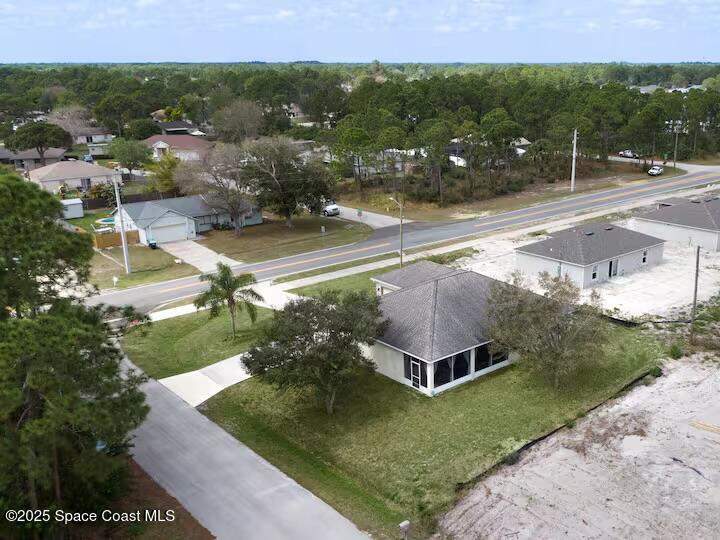 4 bedroom Single Family Residence at 581 Eldron Boulevard, Port Malabar Unit 10, Palm Bay — photo 3