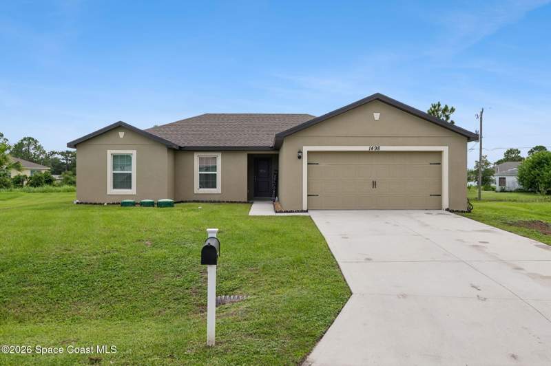 3 bedroom Single Family Residence at 1498 Paramount Avenue, Port Malabar Unit 16, Palm Bay — photo 1