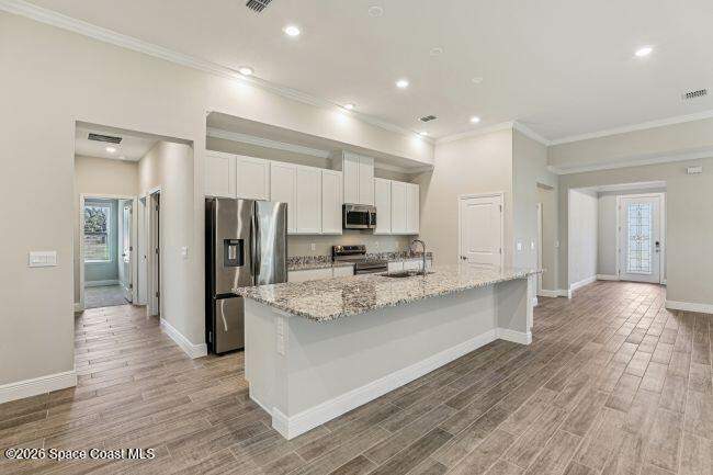 4 bedroom Single Family Residence at 1034 Windmill Street, Port Malabar Unit 17, Palm Bay — photo 3