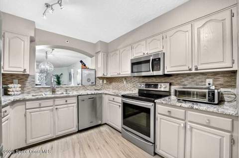 343 N Tropical Trail #204, Merritt Island FL - photo 12 of 63