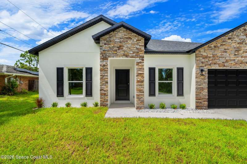 4 bedroom Single Family Residence at 1024 Tevis Street, Port Malabar Unit 17, Palm Bay — photo 3