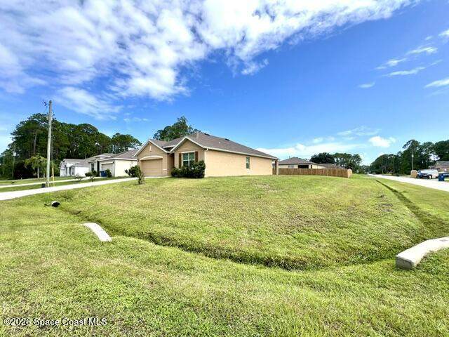4 bedroom Single Family Residence at 392 Ocarina Street, Port Malabar Unit 31, Palm Bay — photo 4