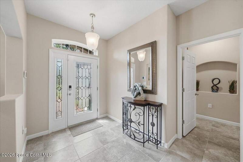 4 bedroom Single Family Residence at 655 Gleneagles Drive, Stonebriar at Bayside Lakes, Palm Bay — photo 4