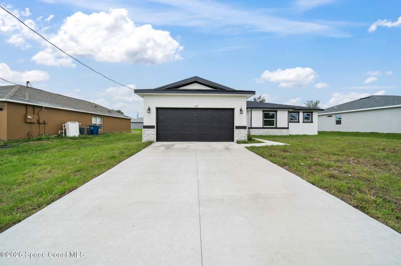 4 bedroom Single Family Residence at 1365 Gilroy Street, Port Malabar Unit 26, Palm Bay — photo 2