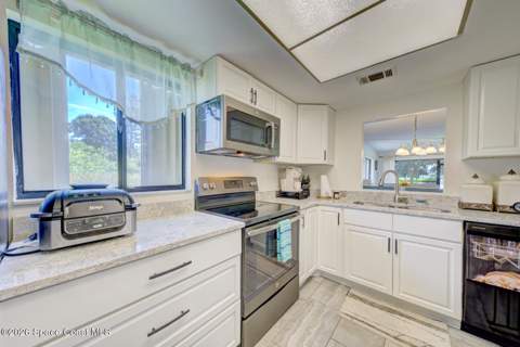 2775 N Wickham Road #A-101, Melbourne FL - photo 7 of 31