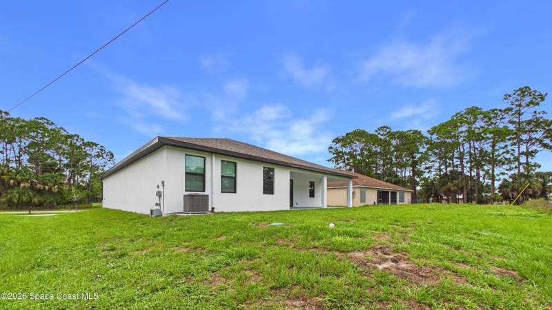 3 bedroom Single Family Residence at 1327 De Groodt Road, Port Malabar Unit 32, Palm Bay — photo 4