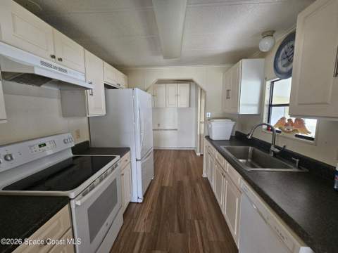 1302 Waterway Drive, Barefoot Bay FL - photo 8 of 19