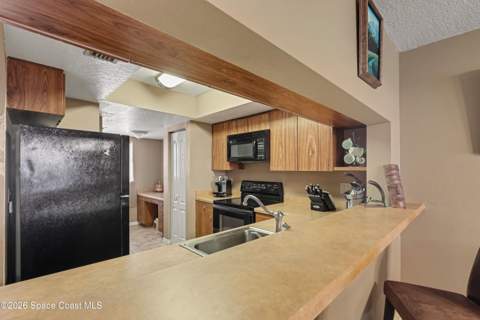 3165 N Atlantic Avenue #C208, Cocoa Beach FL - photo 12 of 36