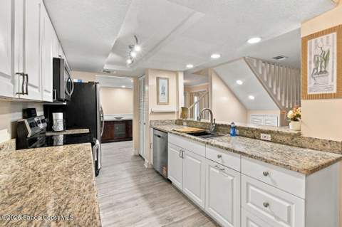 8752 Cocoa Court, Cape Canaveral FL - photo 10 of 47