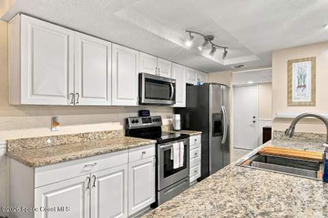 8752 Cocoa Court, Cape Canaveral FL - photo 11 of 47