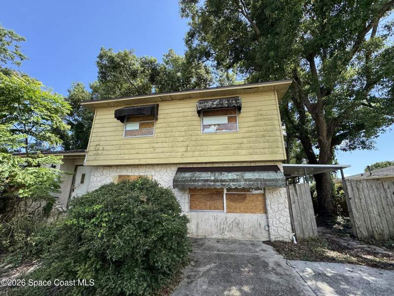 4 bedroom Single Family Residence at 999 Sycamore Drive, Woodsmere Sec 2 Block 8, Rockledge — photo 2