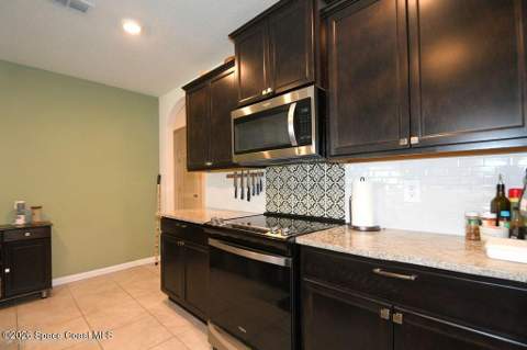 1358 Zanzibar Road, Palm Bay FL - photo 8 of 32