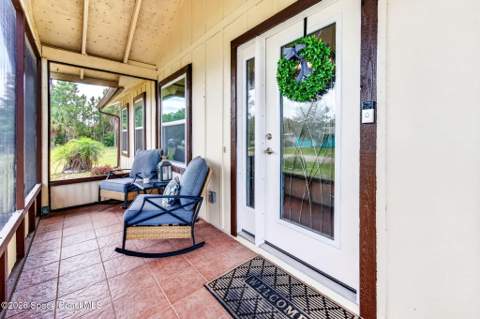 528 Tropicaire Avenue, Palm Bay FL - photo 7 of 39