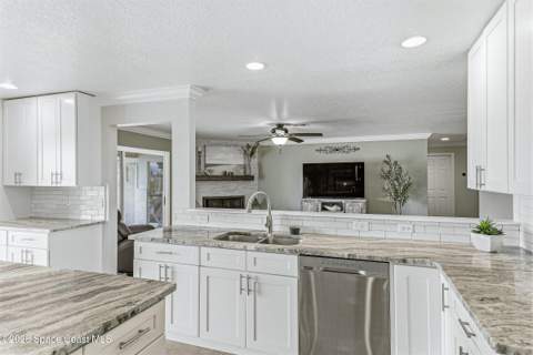 1031 E River Oaks Drive, Indialantic FL - photo 9 of 58
