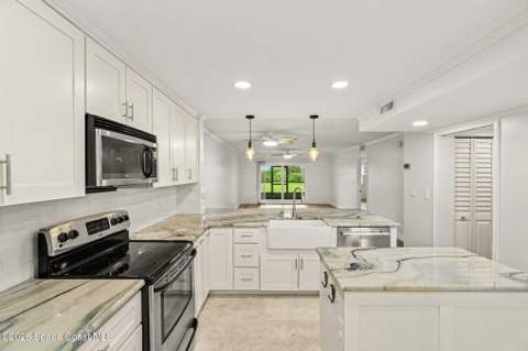 3165 N Atlantic Avenue #B106, Cocoa Beach FL - photo 9 of 45