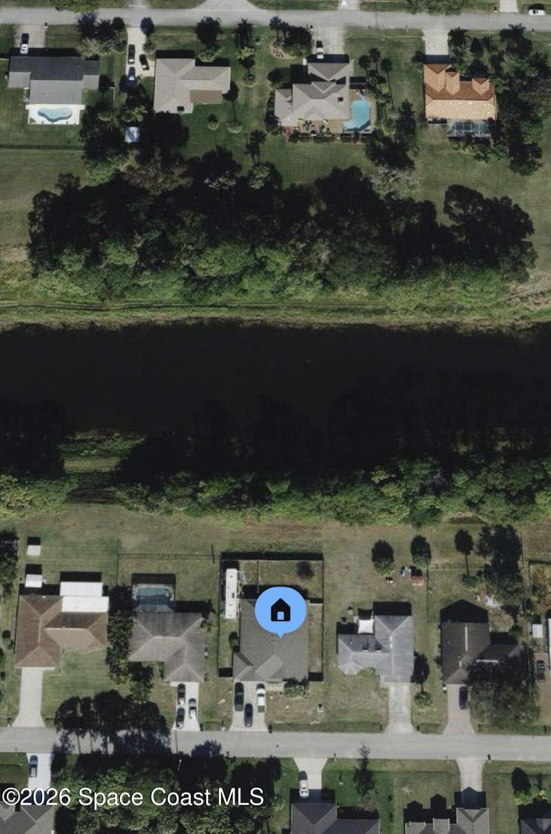 5 bedroom Single Family Residence at 335 Evergreen Street, Port Malabar Unit 7, Palm Bay — photo 2