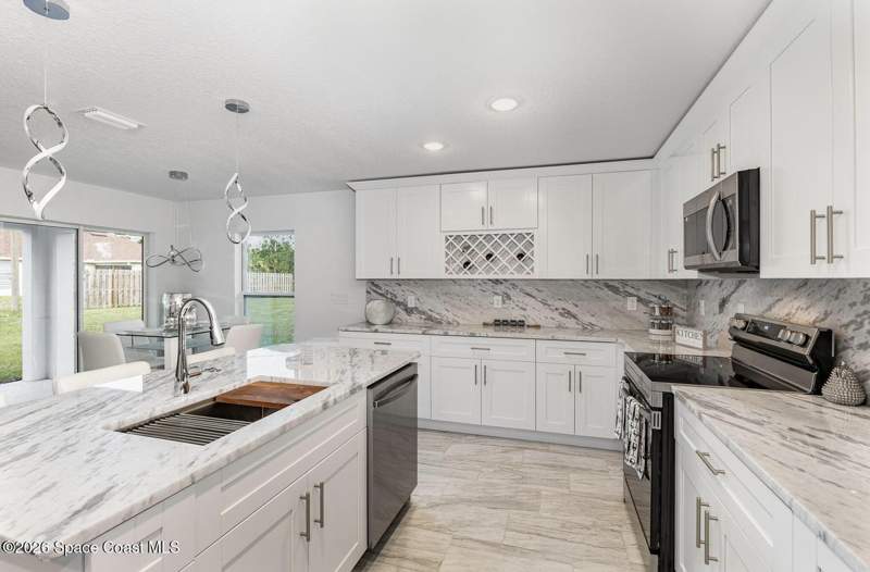 3 bedroom Single Family Residence at 3014 San Filippo Drive, Port Malabar Unit 25, Palm Bay — photo 2