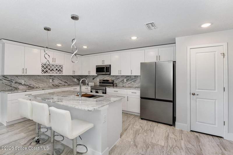 3 bedroom Single Family Residence at 3014 San Filippo Drive, Port Malabar Unit 25, Palm Bay — photo 5