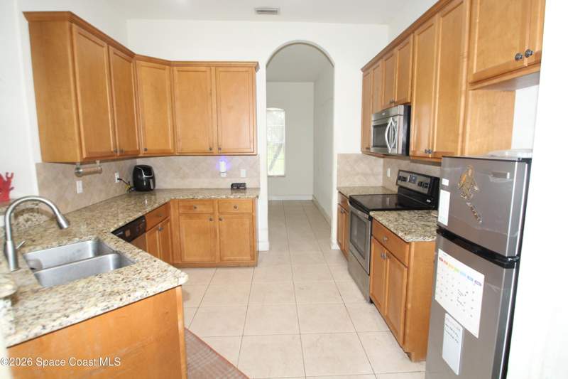 3 bedroom Single Family Residence at 1131 Larkspur Street, Port Malabar Unit 24, Palm Bay — photo 2