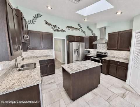 107 Windward Way, Indian Harbour Beach FL - photo 7 of 12