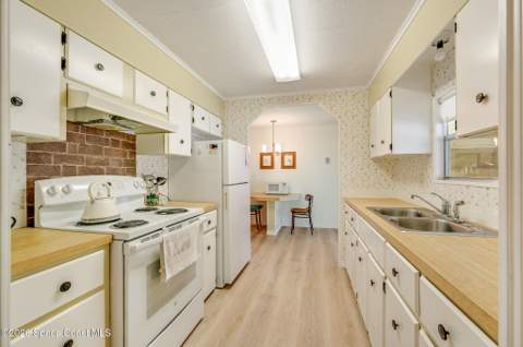 908 Thrush Circle, Barefoot Bay FL - photo 7 of 45