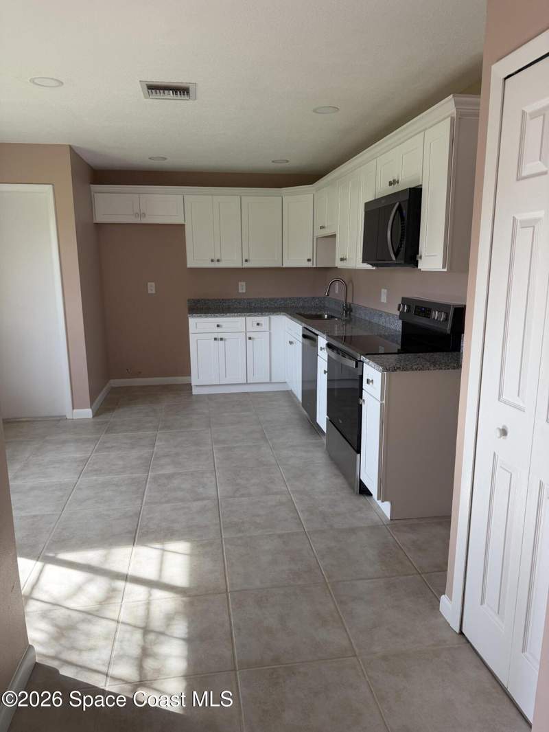 3 bedroom Single Family Residence at 1664 NW Jacinto Avenue, Port Malabar Unit 44, Palm Bay — photo 4