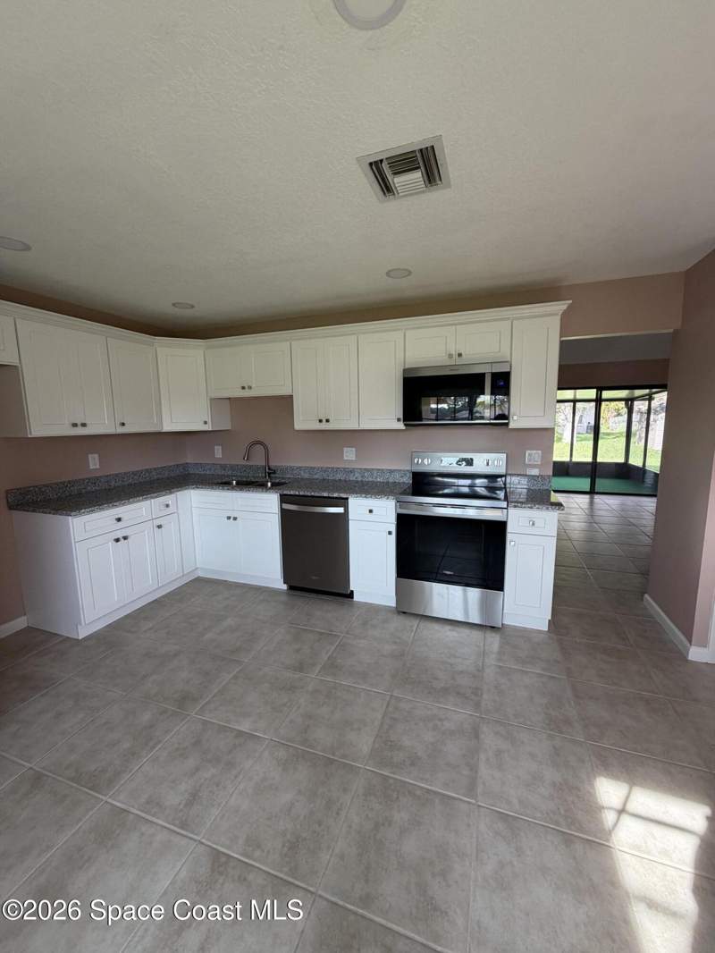 3 bedroom Single Family Residence at 1664 NW Jacinto Avenue, Port Malabar Unit 44, Palm Bay — photo 5