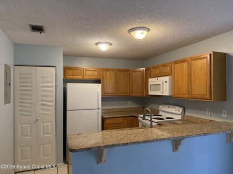 1461 Sheafe Avenue #106, Palm Bay FL - photo 6 of 13
