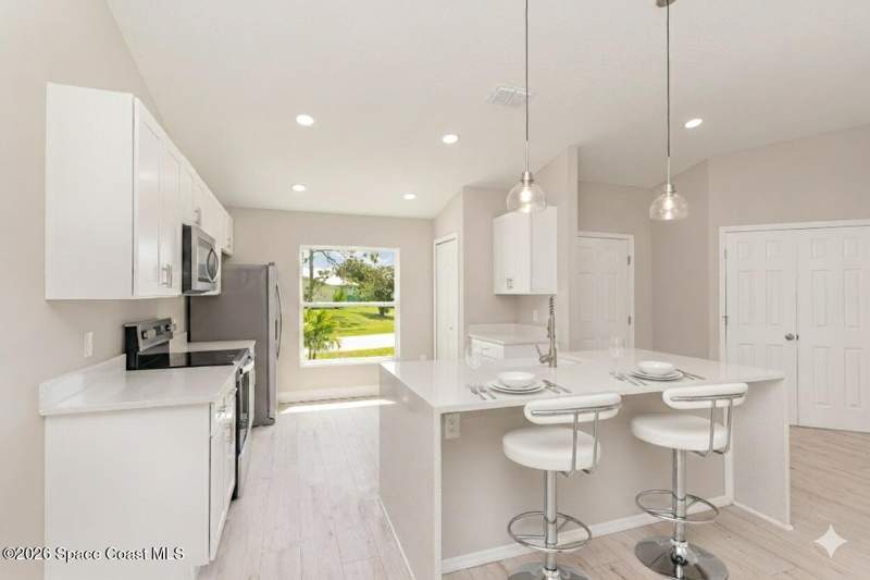 4 bedroom Single Family Residence at 426 Scodella Street, Port Malabar Unit 37, Palm Bay — photo 4