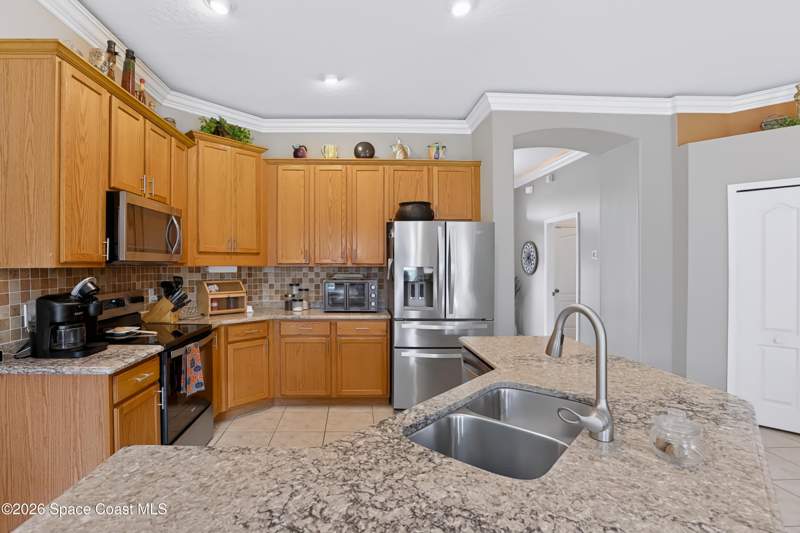 4 bedroom Single Family Residence at 2061 Thornwood Drive, Magnolia Park at Bayside Lakes, Palm Bay — photo 3