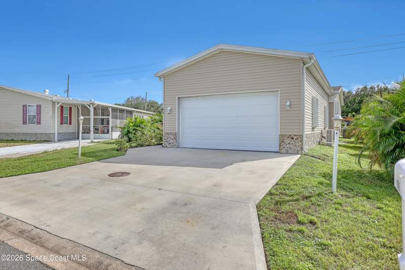 3 bedroom Single Family Residence at 879 Laurel Circle, Barefoot Bay Unit 2 Part 12, Barefoot Bay — photo 2