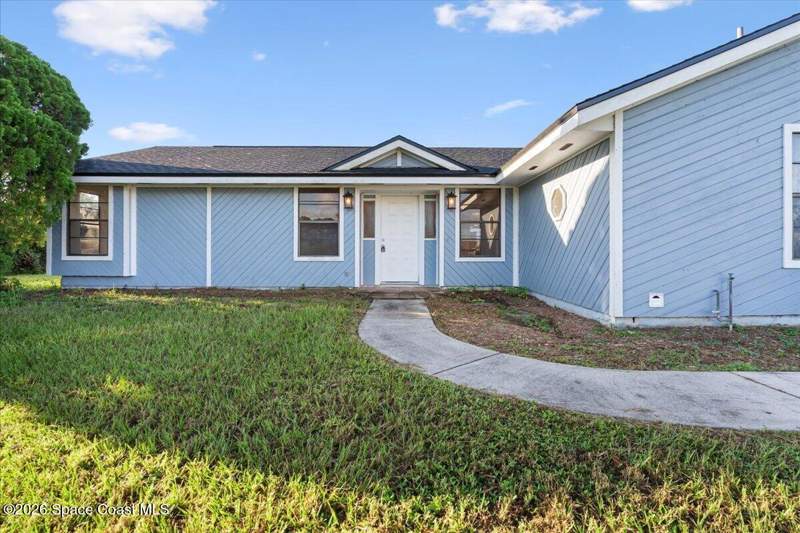4 bedroom Single Family Residence at 48 Emerson Drive, Port Malabar Unit 44, Palm Bay — photo 2