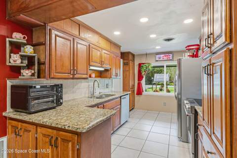 6597 Norman Drive, Melbourne Village FL - photo 14 of 60